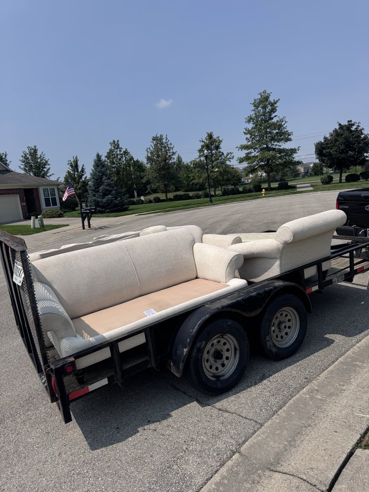 Furniture removal trailer loaded with a sofa and chair in Carmel, IN by A1 Home Services Furniture removal trailer loaded with a sofa and chair in Carmel, IN by A1 Home Services